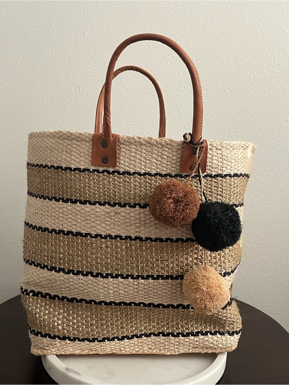 Woven Stripe Tote with Pom-Pom Accents in Natural and Black